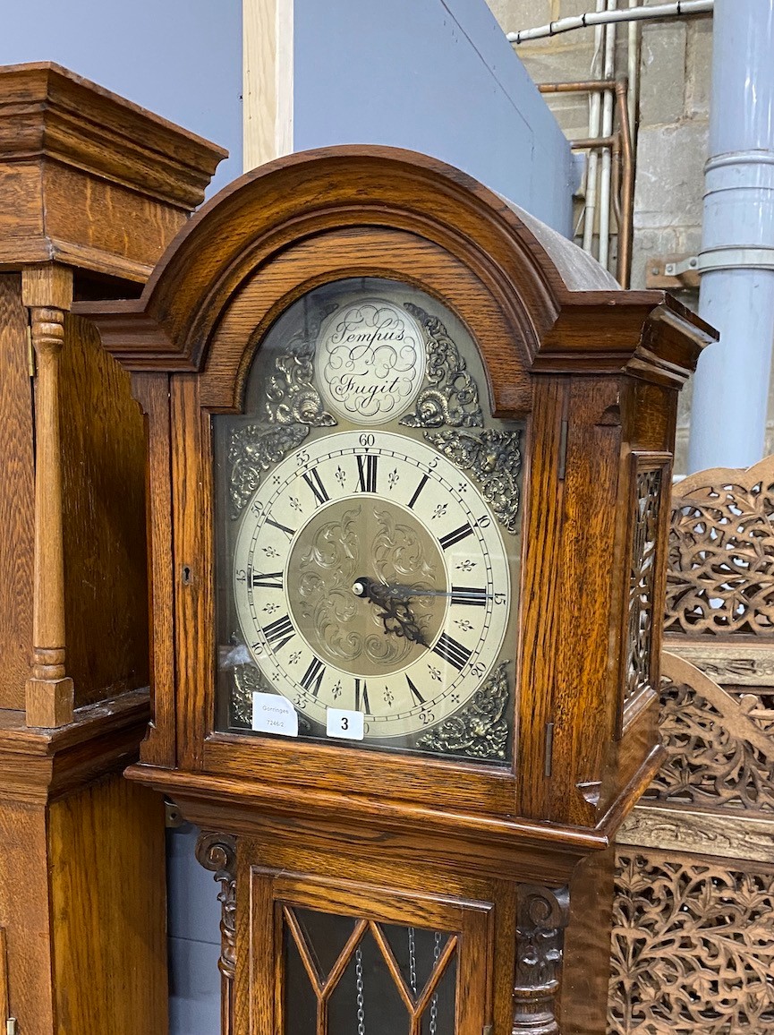 A modern oak longcase clock, with 